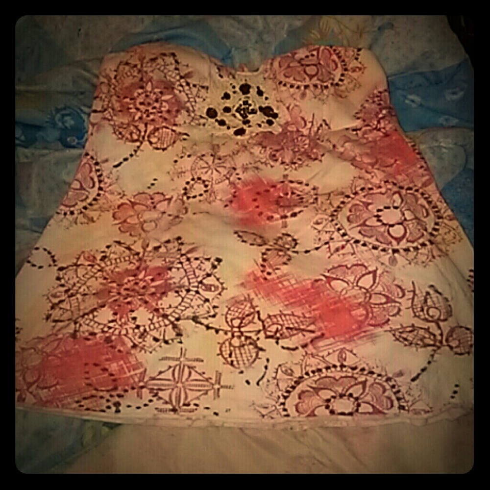 Tube top orange flowers and red.